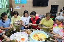 公明社区:一枚香粽串起邻里情,三方共融绘就基层治理新图景